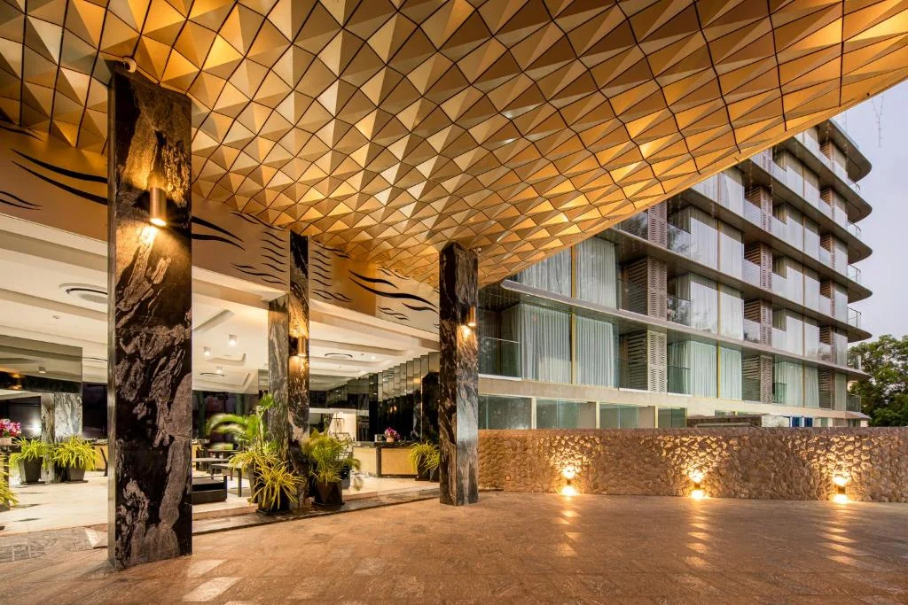 Illuminated covered entrance and arrival court at Andaman City Phuket